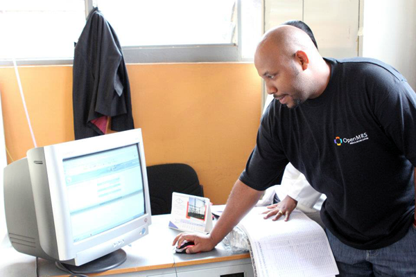 An OpenMRS implementer-programmer gives a demonstration of the system as his clinic.